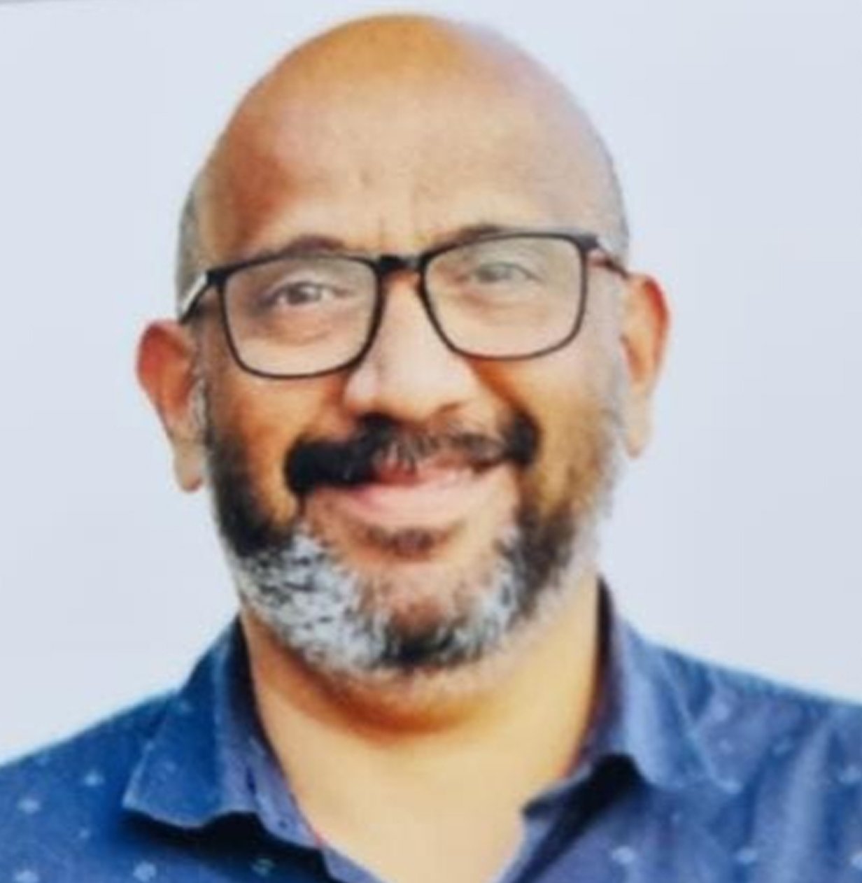 Mr. PUTHANVEETIL JAYAKRISHNAN NAIR
