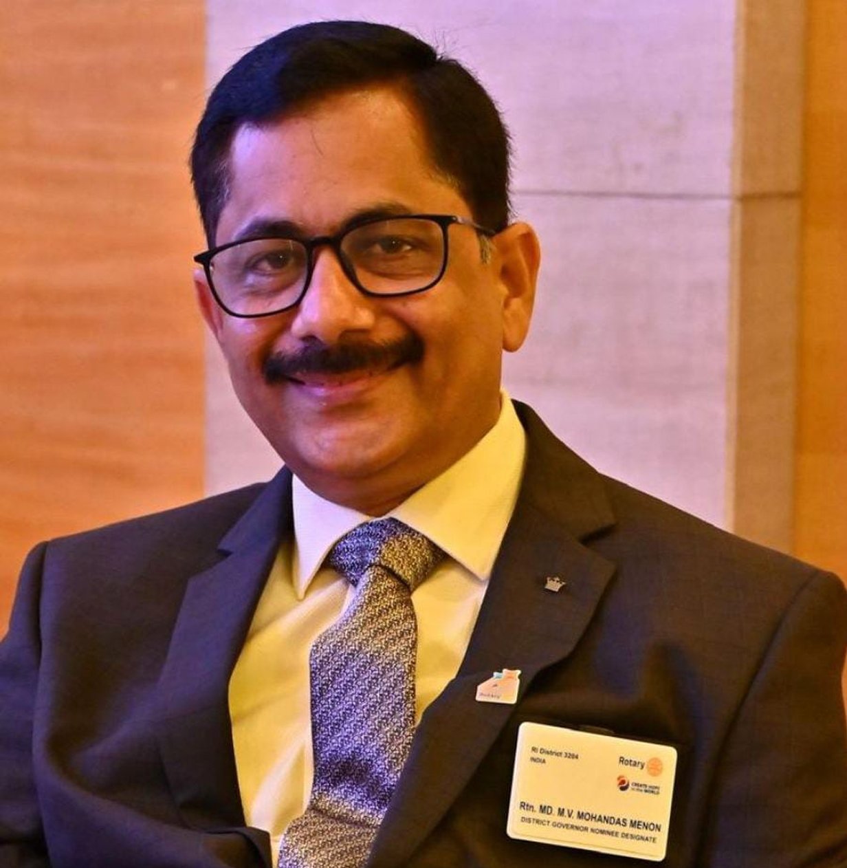 Mr. METHILE VEETIL MOHANDAS MENON