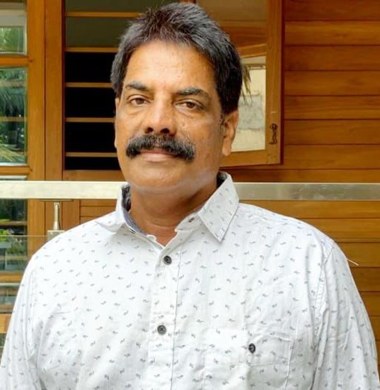 Mr. NEICHALATH RADHAKRISHNAN